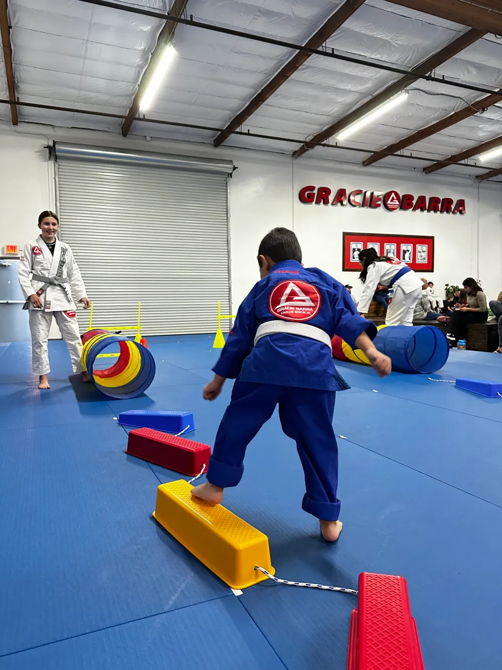 Young student practicing a drill at Gracie Barra Upland